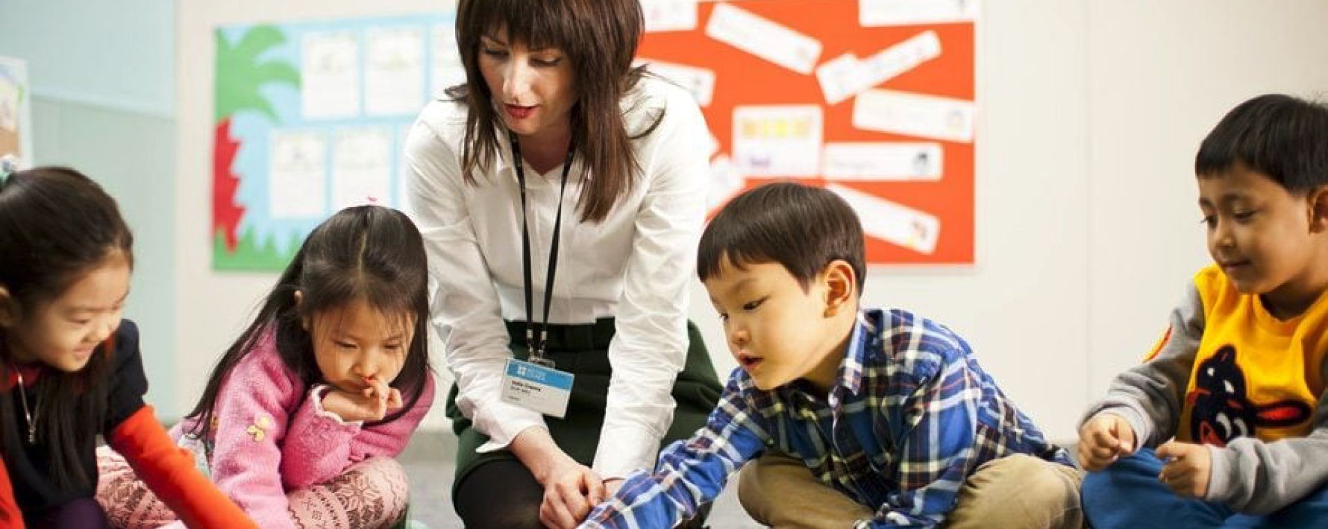 How do Korean mothers teach their children to learn English?